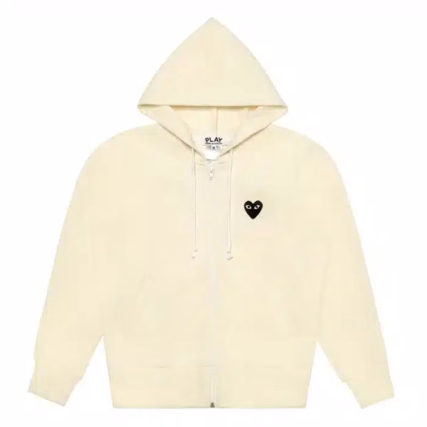 Cremefarbener CDG-Kapuzenpullover mit Reißverschluss und schwarzem Herz Cremefarbener CDG-Kapuzenpullover mit Reißverschluss und schwarzem Herz